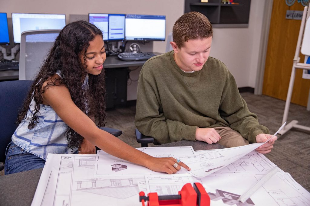 Central Tech Drafting students reviewing blueprints